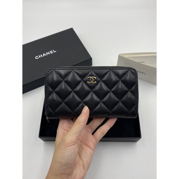 Kept unused Chanel zippy medium wallet HL28 black caviar light gold