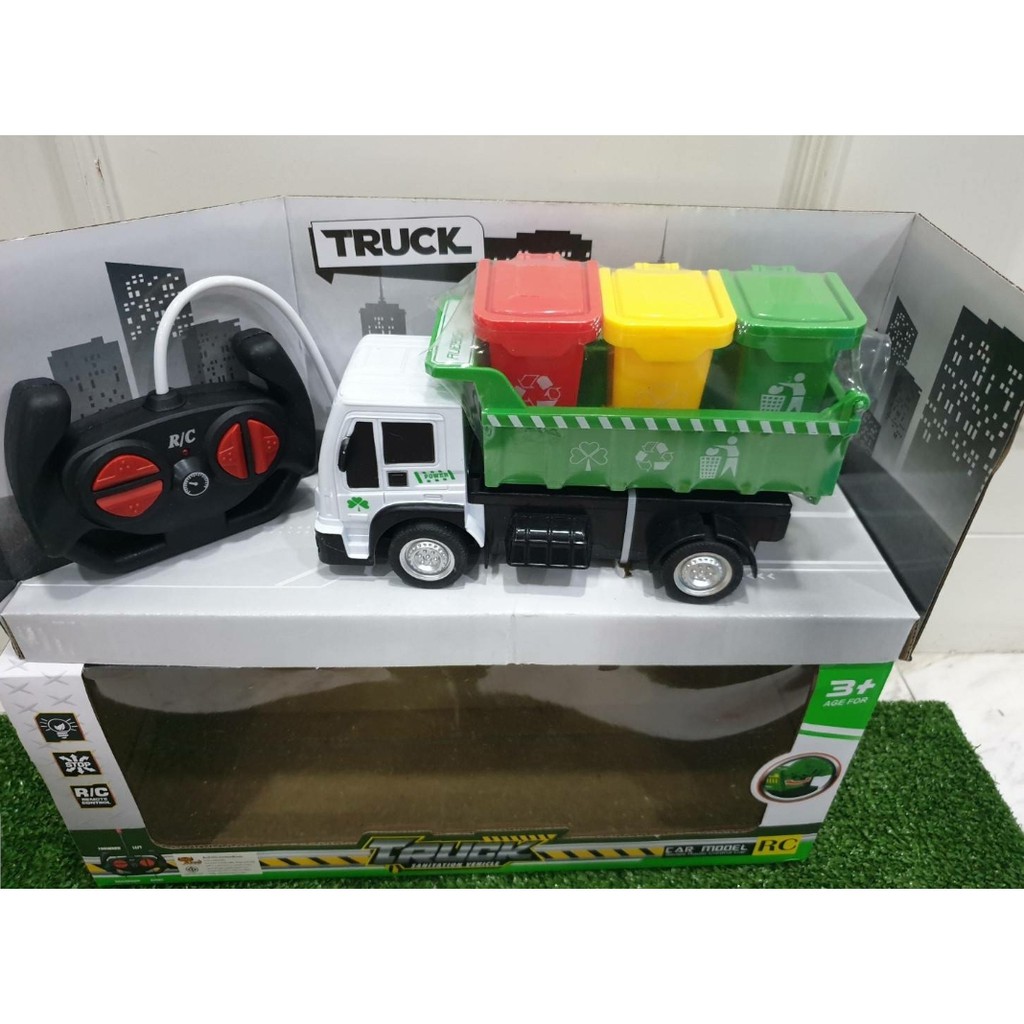 สินค้าขายดี!!! Toyของเล่นรถบังคับ รถบรรทุกถังขยะ Rubbish Truck ถัง 3 ใบ เดินหน้าถอยหลัง เลี้ยวซ้าย-ขวา ไร้สาย (สีเขียว) no.988-12 ## ของเล่นเด็ก โมเดล โมเดลรถ ของเล่น ของสะสม รถ หุ่นยนต์ ตุ๊กตา โมเดลนักฟุตบอล ฟิกเกอร์ Model