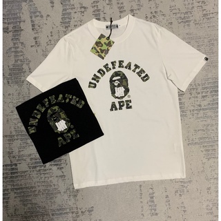 [S-5XL]Bape X UNDEFEATED เสื้อยืด คอกลม แขนสั้น พิมพ์ลายพราง สีขาว สีดํา สไตล์ฮิปฮอป สําหรับผู้ชาย ผู้หญิง