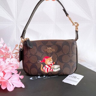 NOLITA 15 IN SIGNATURE CANVAS WITH CAT (COACH C0090)