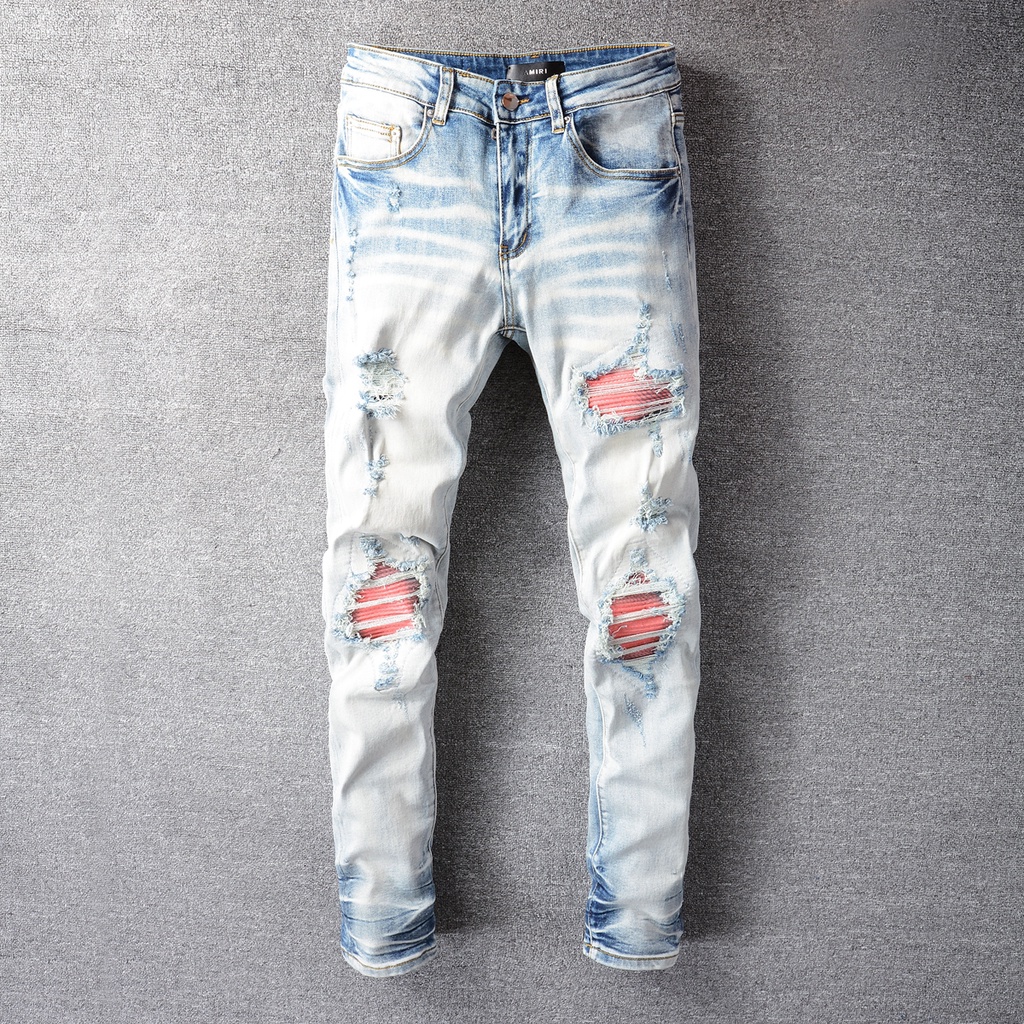 red patch amiri jeans