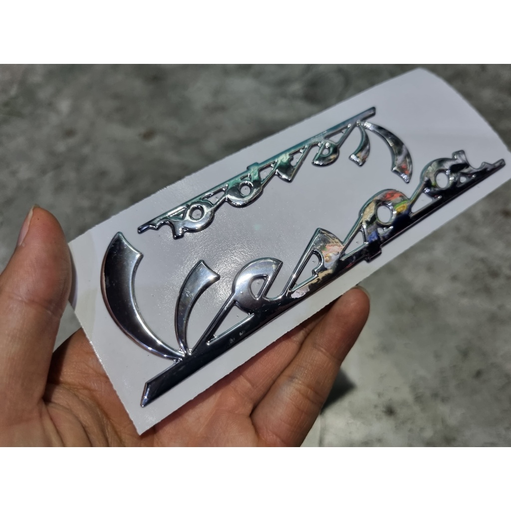 โลโก้สติกเกอร์ เวสป้า สีเงิน ขนาด ใหญ่ 15 * 5 cm / เล็ก 10 * 3.2 cm VESPA Emblem Logo Sticker front panel, side panel