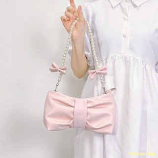 💎การจัดส่งที่รวดเร็ว#🚑Girl Pearl Bow Underarm Bag 2022 New New Fairy Bag Korean Version One Shoulder Messenger Bag . ก