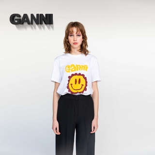 Ganni เสื้อยืดแขนสั้น ผ้าฝ้าย ทรงหลวม พิมพ์ลายดาว ดอกทานตะวัน หน้ายิ้ม