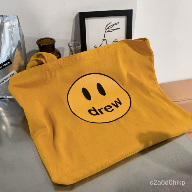 Drew House Yellow Logo Mascot Tote Bag ถุงผ้าดิวส์เฮ้าส์ รูปยิ้ม 
