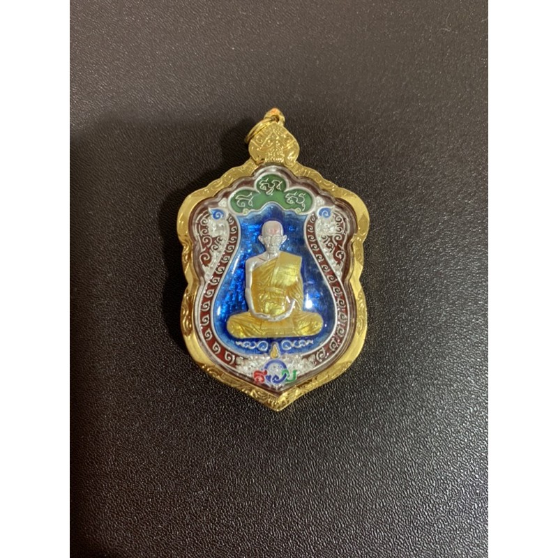 หลวงพ่อรวย รุ่นรวย99(วัดแตก) เนื้อเงินลงยาฟ้า เลี่ยมทองแท้