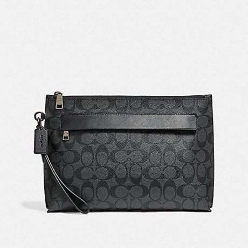 COACH CARRYALL POUCH IN SIGNATURE CANVAS