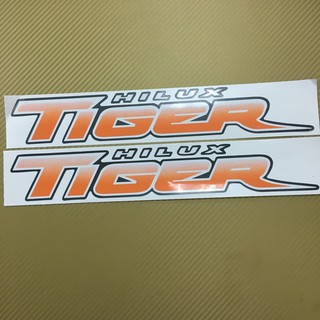 สติกเกอร์ TIGER สีส้ม ติดข้างท้ายกระบะ  Toyota HILUX ปี 2003 ราคาต่อคู่ มี 2 ชิ้น