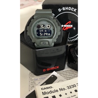 Casio G-shock DW-6900LU-1 นาฬิกาข้อมือ สายทูโทนสองสี เขียวส้ม