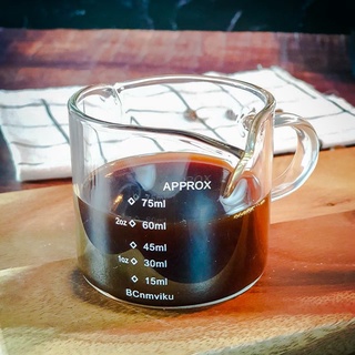 แก้วตวงสองปาก มีสเกล ขนาด 75 ml.  Double mouthed cup 75 ml.