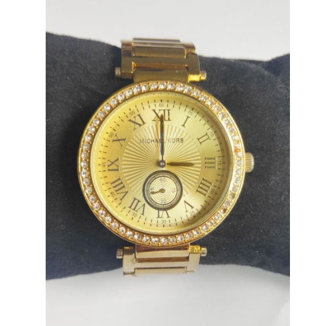 นาฬิกาแบรนด์เนมMichael Kors เข็มกลมเล็กด้านในใช้งานได้จริง สายสแตนเลสสีทอง สภาพใช้งานได้ปกติ