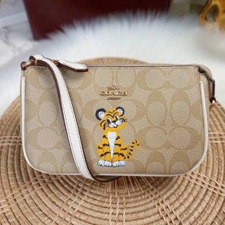 COACH NOLITA 19 IN SIGNATURE CANVAS WITH TIGER (C7699)