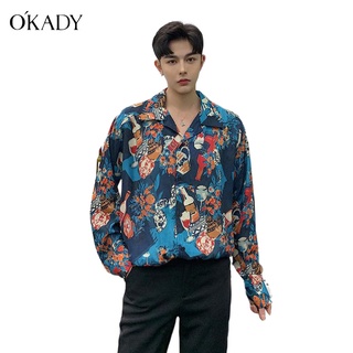 OKADY เสื้อเชิ้ตผู้ชายเสื้อเชิ้ตลายดอกไม้ส่วนบุคคลแนวโน้มแฟชั่นเสื้อเชิ้ตแขนยาวผู้ชายย้อนยุคพิมพ์เสื้อเชิ้ตหลวม เสื้อเชิ้ตผู้ชายแขนยาว