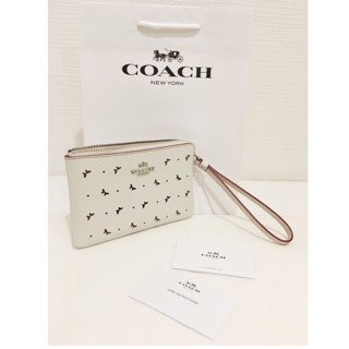 Coach กระเป๋าคล้องมือหนัง PU ของแท้ฉลุลาย