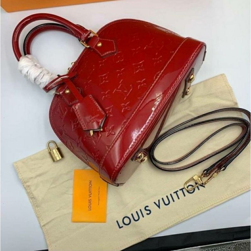 กระเป๋า LV Aruma สีแดง หนังแก้ว.