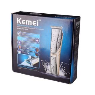 Kemei ปัตตาเลี่ยนตัดผมไร้สาย กันน้ำได้ ที่ตัดผม ตัดผมเด็ก พร้อมหวีรอง 4 ขนาด อุปกรณ์ครบชุด รุ่น KM-5018