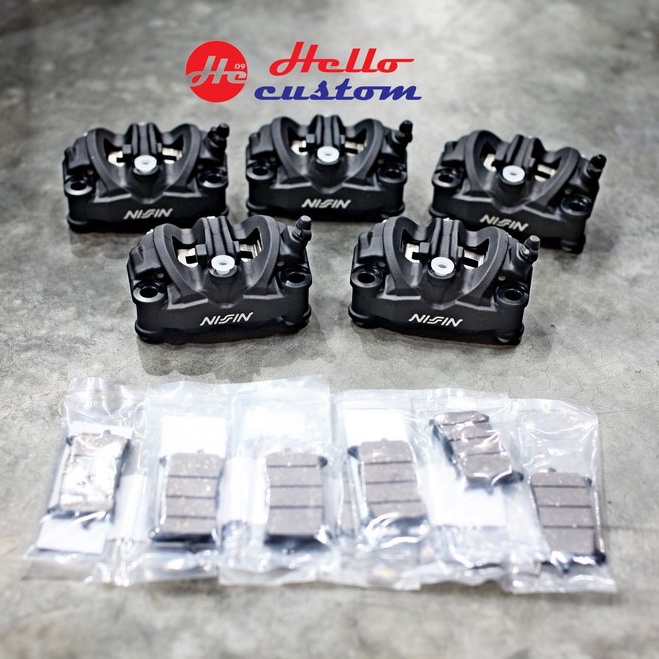 ปั้มเบรค NISSIN 100mm 4Pot ปั้ม พร้อมผ้าเบรค แท้ศูนย์ ( ปั้มเบรคหน้า CB150R )