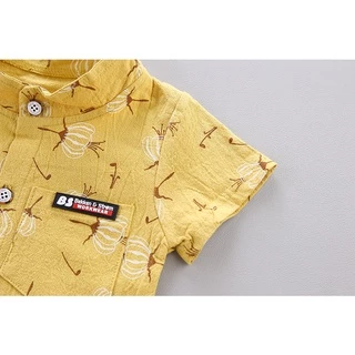เสื้อเชิ้ตลายดอกแดนดิไลออนเด็กชายยุโรปและอเมริกา กางเกงขาสั้นสีทึบ ชุดลำลองเด็กฤดูร้อนสไตล์ตะวันตก