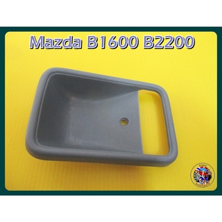 เบ้ารองมือเปิดใน สีเทา  -  Mazda B1600 B2200 Inner Handle Door (Grey)