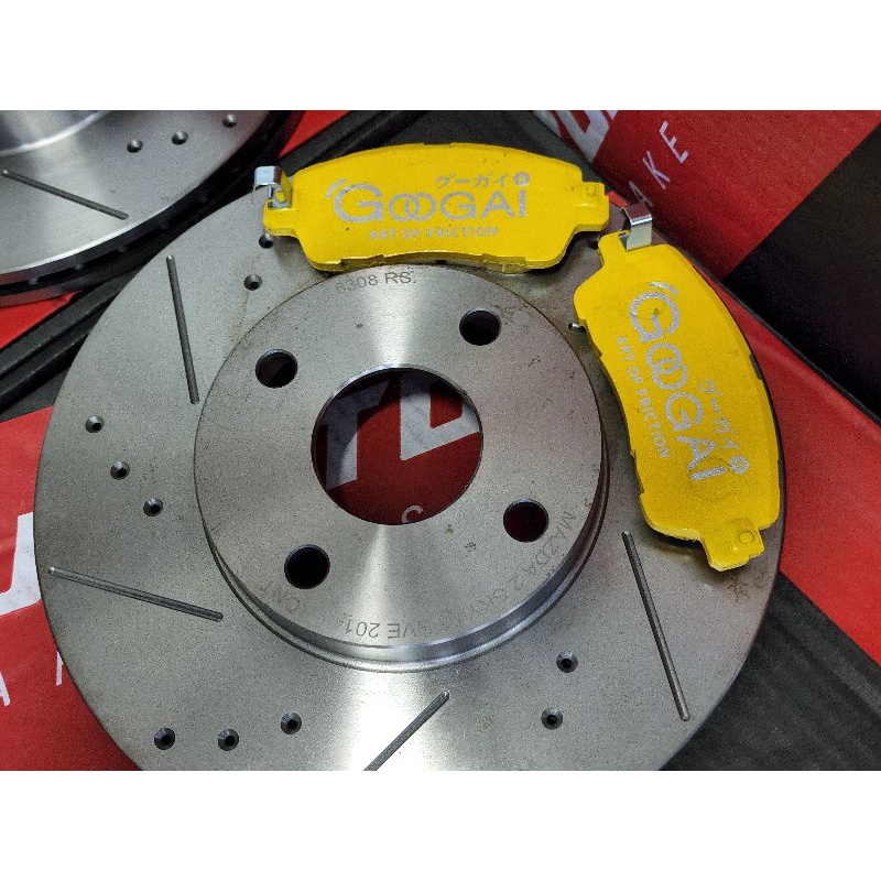 จาน slot + ผ้าเบรค Googai kirin 650c mazda2sky