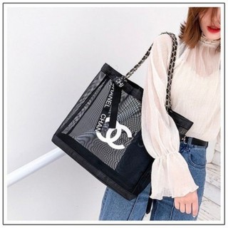 กระเป๋าสะพาย ผ้าตาข่าย มีลายหน้าหลัง ลาย ชาแนล chanel ขนาด 44x31x10 cm