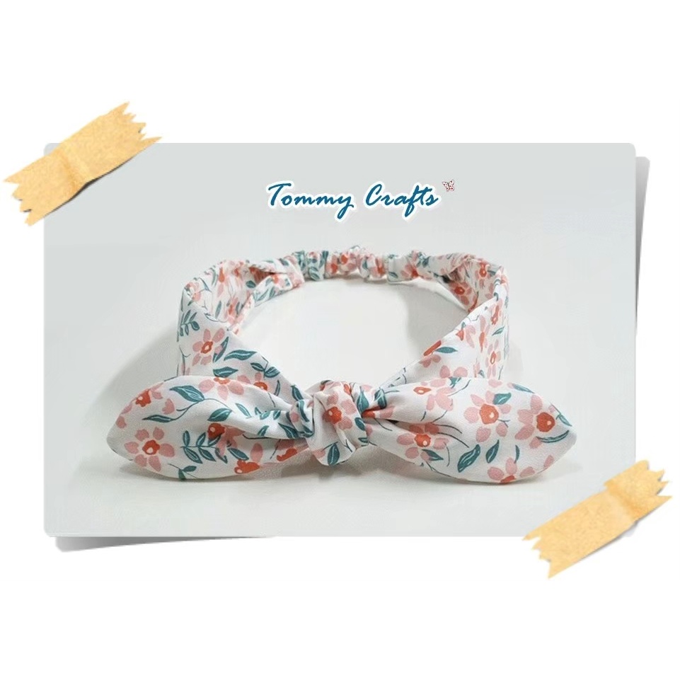 ผ้าคาดผมโบว์ผ้าคอตตอนทวิล ลายดอกไม้น่ารักๆ สีชมพูส้ม Floral print cotton twill Hairband
