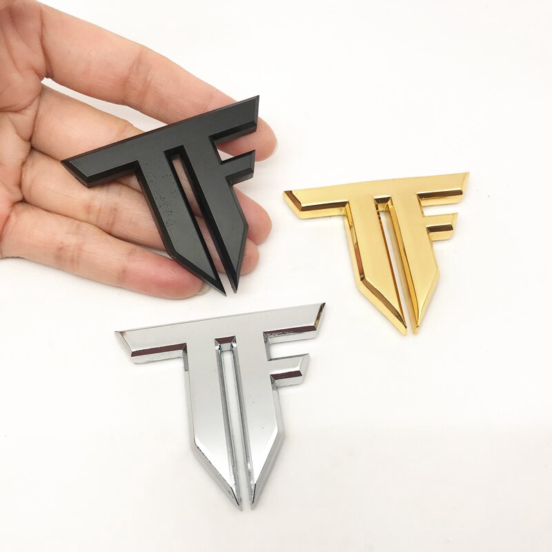 จัดแต่งทรงผมรถ 3D โลหะ TF ป้ายสัญลักษณ์ Transformers สติกเกอร์สําหรับ Hyundai Toyota Nissan Audi Skoda Renault Opel Lada Chevrolet
