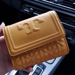 Tory Burch Tory Burch Bryant Quilted Leather Foldable Mini Wallet  # 46184 0218 -Made of quilted leather.