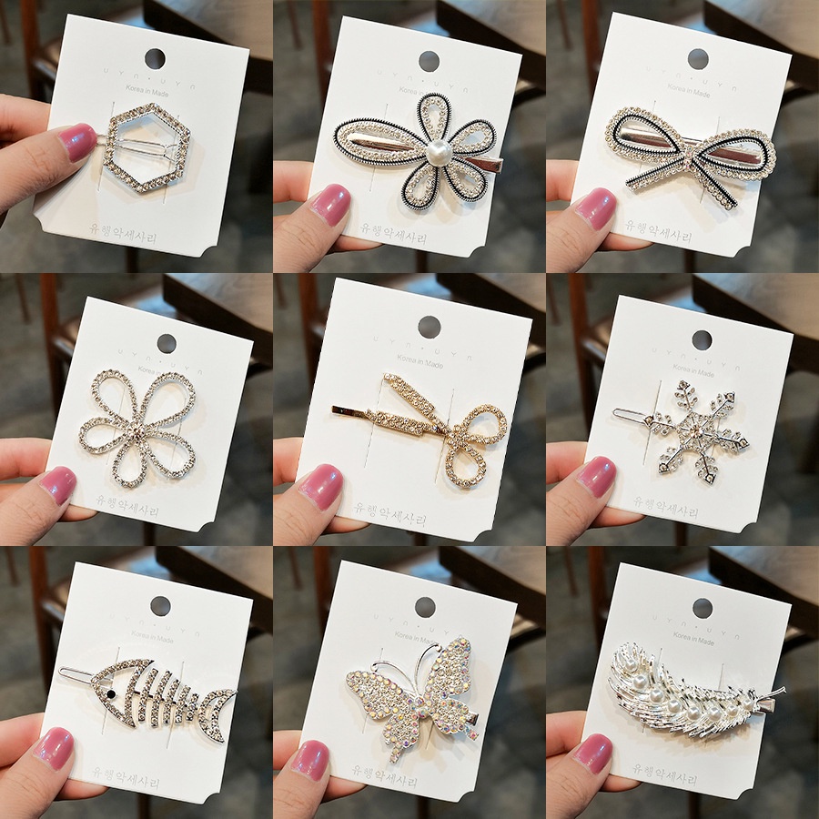 A cute women's hair clip and accessory with a small metal hairpin