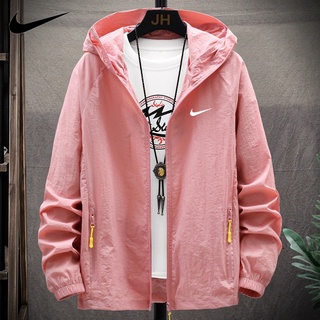 Nike ของแท้ 100% ใหม่ เสื้อคลุมกันแดด กันลม น้ําหนักเบา ระบายอากาศ ป้องกันรังสียูวี เหมาะกับฤดูร้อน สําหรับผู้หญิง