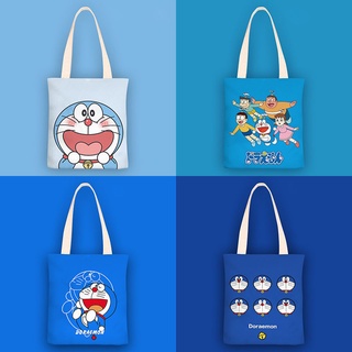 Canvas กระเป๋าสะพายไหล่กระเป๋าผ้าใบพิมพ์ลายการ์ตูน Doraemon ขนาดเล็กสําหรับผู้หญิง