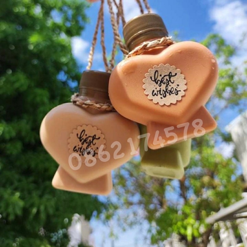 ขวดพลาสติก ขนาด 100 ml ทรงหัวใจ ( 50 ใบ + พร้อมฝา เลือกสีฝาได้ ) บรรจุเครื่องดื่ม พลาสติ beกใส PET