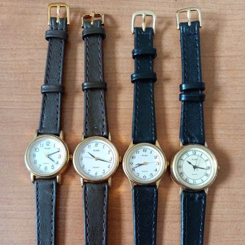 นาฬิกาแบรนด์เนมALBAหน้าปัดสีขาว ตัวเรือนสีทอง สายหนังสีดำของแท้มือสองสภาพสวย
