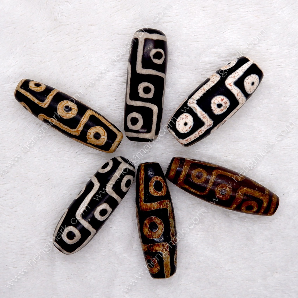 หินทิเบต หินดีซีไอ DZI 9 ตา เป็นหนึ่งในหินที่มีพลังมากที่สุด ช่วยให้ผู้ครอบครองได้รับพร 9 ประการ สำห