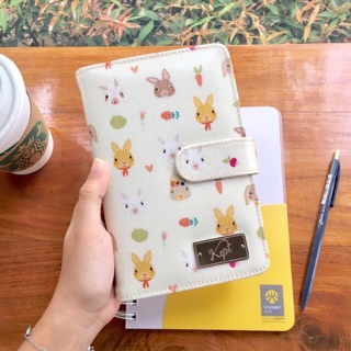 KEPT [ Bookbank Holder ] กระเป๋าใส่สมุดธนาคารผ้าเคลือบกันน้ำ ลายกระต่าย Peter Rabbit (สีส้มเข้มCarrot)