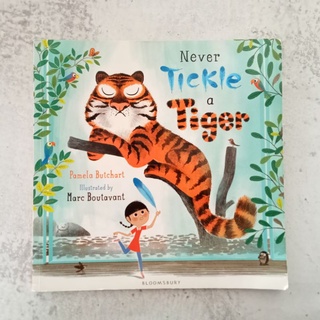 หนังสือปกอ่อน Never Tickle a Tiger มือสอง