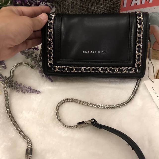 charles and keith chain detail clutch