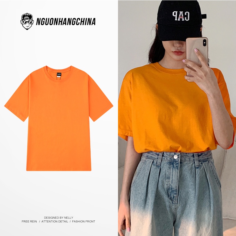 Nelly Heybig เสื้อยืดแขนสั้นสีส้มธรรมดา