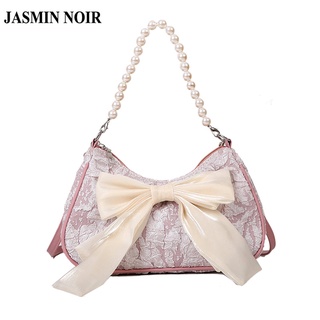 Jasmin Noir กระเป๋าสะพายไหล่ ผ้าแคนวาส ทรงเมสเซนเจอร์ ประดับโบว์ สําหรับผู้หญิง