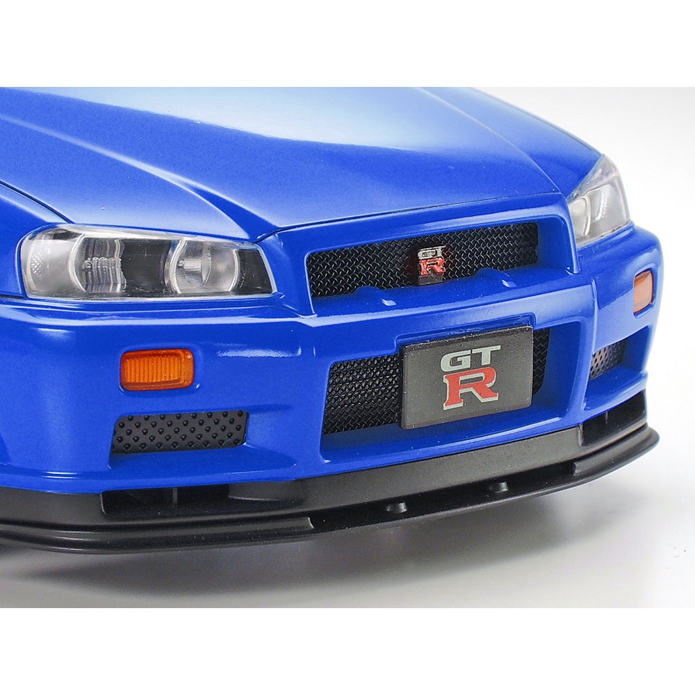 🏆 TAMIYA 24210 ชุดประกอบจำลองมาตราส่วน 1:24 NISSAN SKYLINE GT-R V-spec (R34) โมเดลประกอบ ต้องไปสร้างและทำสีเอง - รูปที่ 3