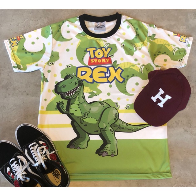 เสื้อ & เดรส ผ้าดาวกระจายลาย TOY STORY REX