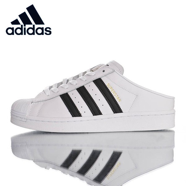 ❅✎【พร้อมส่ง】Adidas Originals Superstar Slip-on Mule รองเท้ากีฬาลำลอง ส้น รองเท้าแตะครึ่งหนึ่ง รองเท้าขี้เกียจ  FX0527
