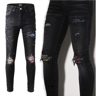 AMIRI cashew flower color print patch fold patch stretch slim black jeans