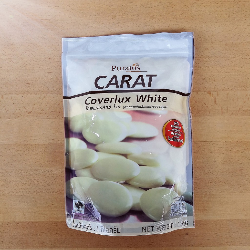 Puratos Carat White ช็อกโกแลตคอมพาวด์ แบบเหรียญ 1 kg ถ้ากลัวละลายเลือกส่งรถเย็นนะคะ