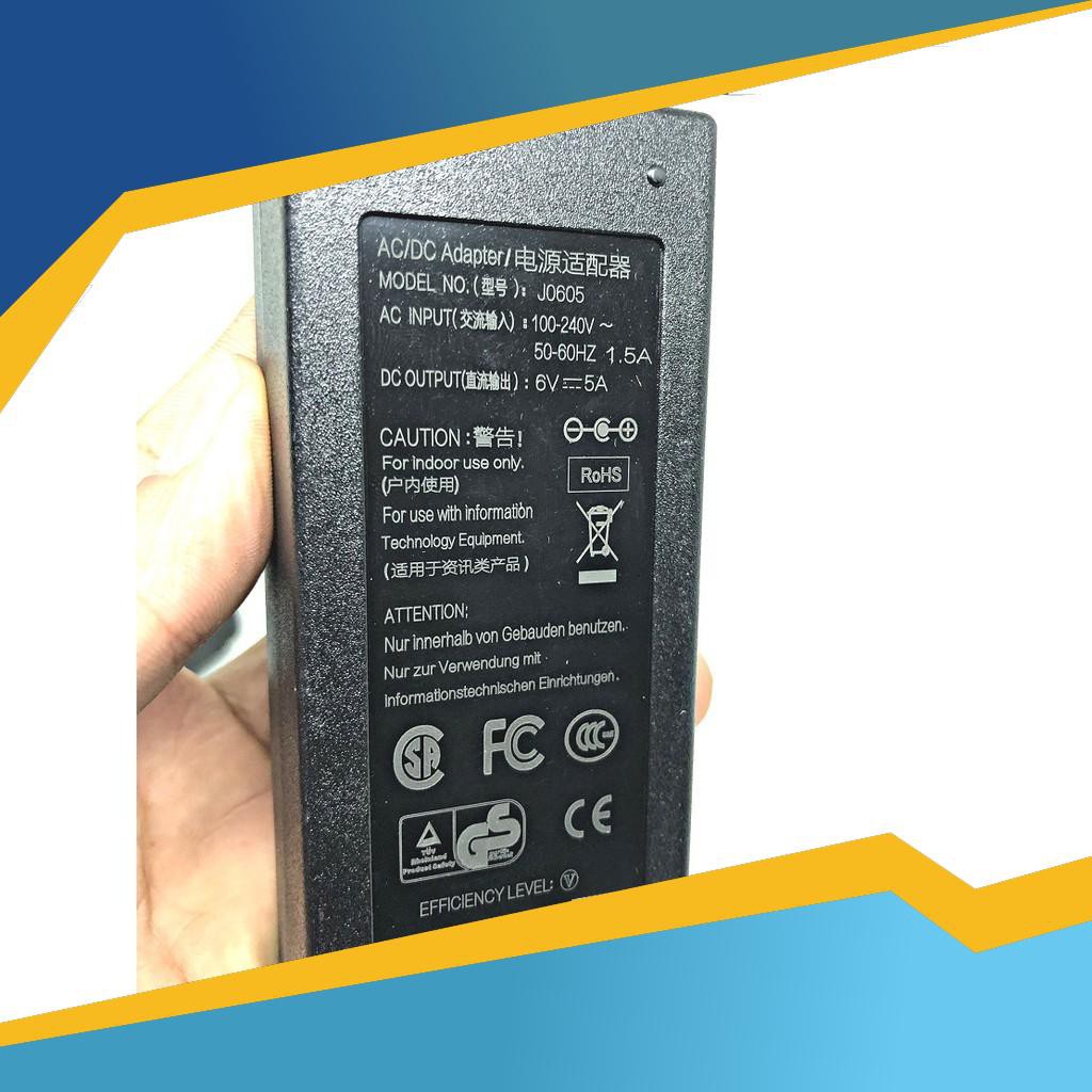 อะแดปเตอร์ AC/DC 6V 5A JC06-05 – แหล่งกําเนิดแสงที่เสถียร ทนทาน สําหรับอุปกรณ์ของคุณ!