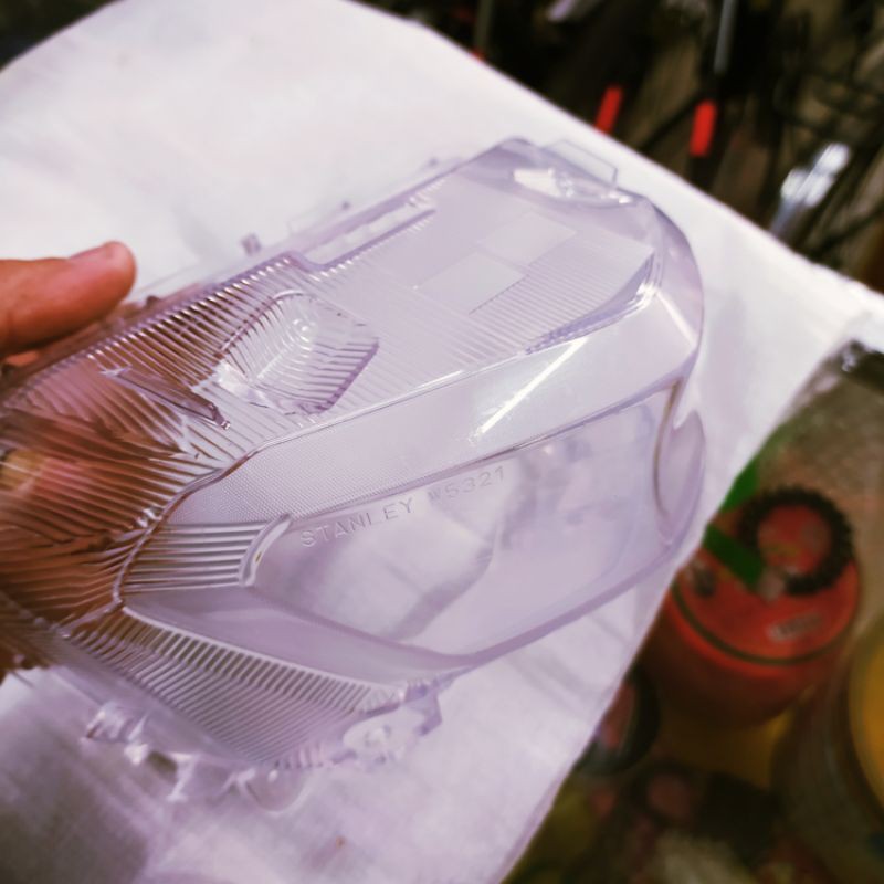 ครอบกระจกไฟหน้าบน Exciter 155