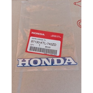 87130-KTL-740ZDสติ๊กเกอร์แท้ HONDA สีขาวพื้นหลังสีน้ำเงิน ติดบังลมเวฟ100รุ่นยูบ๊อก,1ชิ้น อะไหล่แท้ศูนย์HONDA