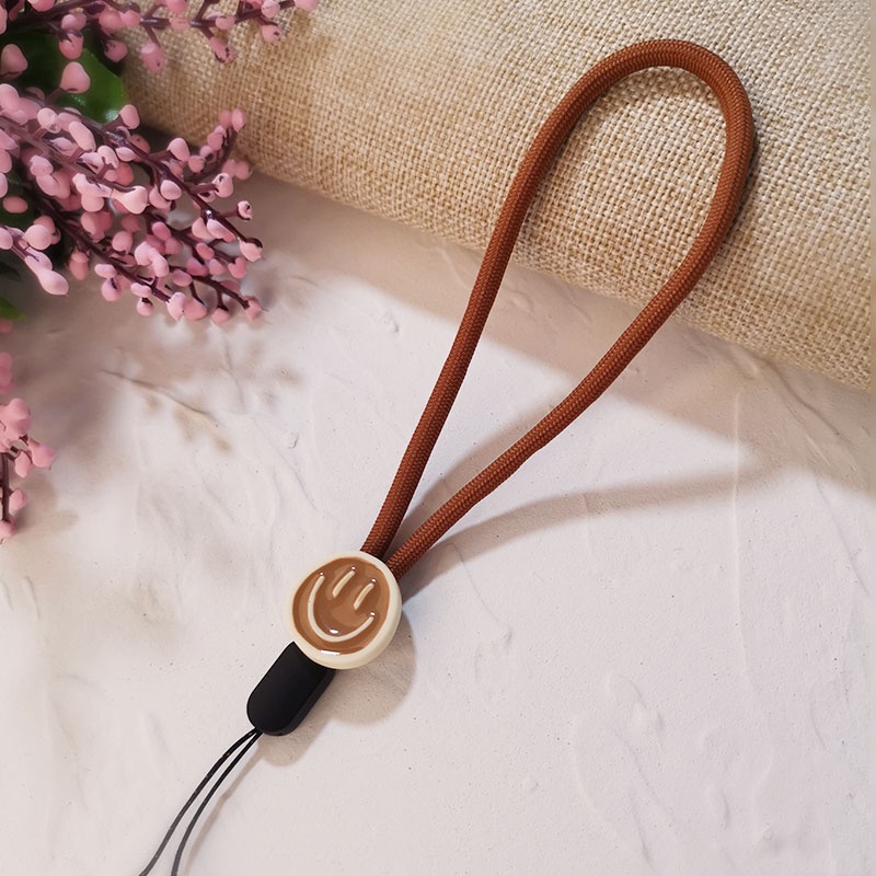 น่ารักรอยยิ้มใบหน้าสายคล้องมือไนลอนสายคล้องโทรศัพท์อ่อนโทรศัพท์มือถือสากลน่ารักเสน่ห์เชือกเส้นเล็กสำหรับ Phone - รูปที่ 2