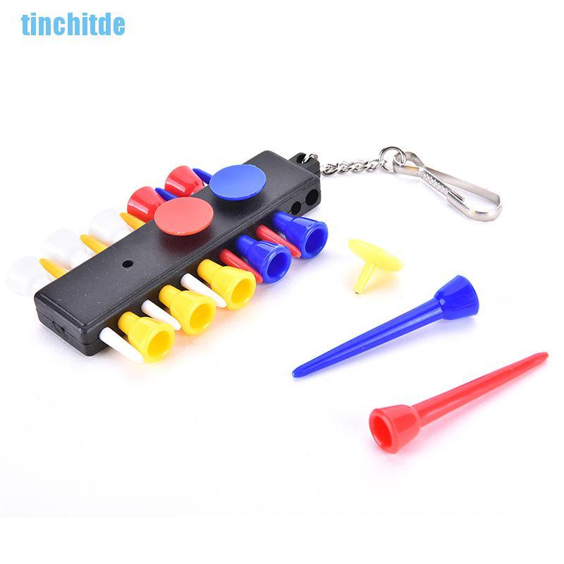 (Tinchitde) ที่วางลูกกอล์ฟ 1 ชิ้น พร้อมขาตั้งลูกกอล์ฟ พลาสติก 12 ชิ้น และหน้ากากลูกกอล์ฟ 3 ชิ้น และพวงกุญแจ 1 ชิ้น