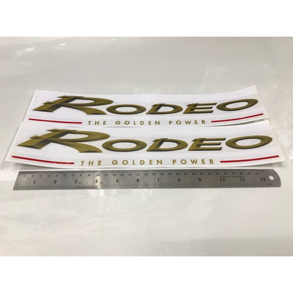 สติ๊กเกอร์ RODEO THE GOLDEN POWER สีทองมีเส้นแดง ติดแค๊ป ISUZU RODEO